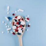 various pills wooden spoon scaled 1